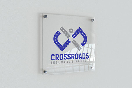 Crossroads Insurance Agency logo printed on a fiber glass